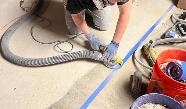 Man conducting drywall repair